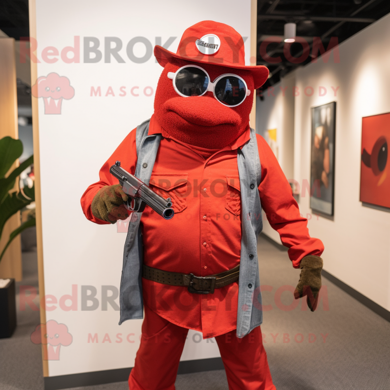 Red Sniper mascot costume character dressed with a Boyfriend Jeans and Cufflinks