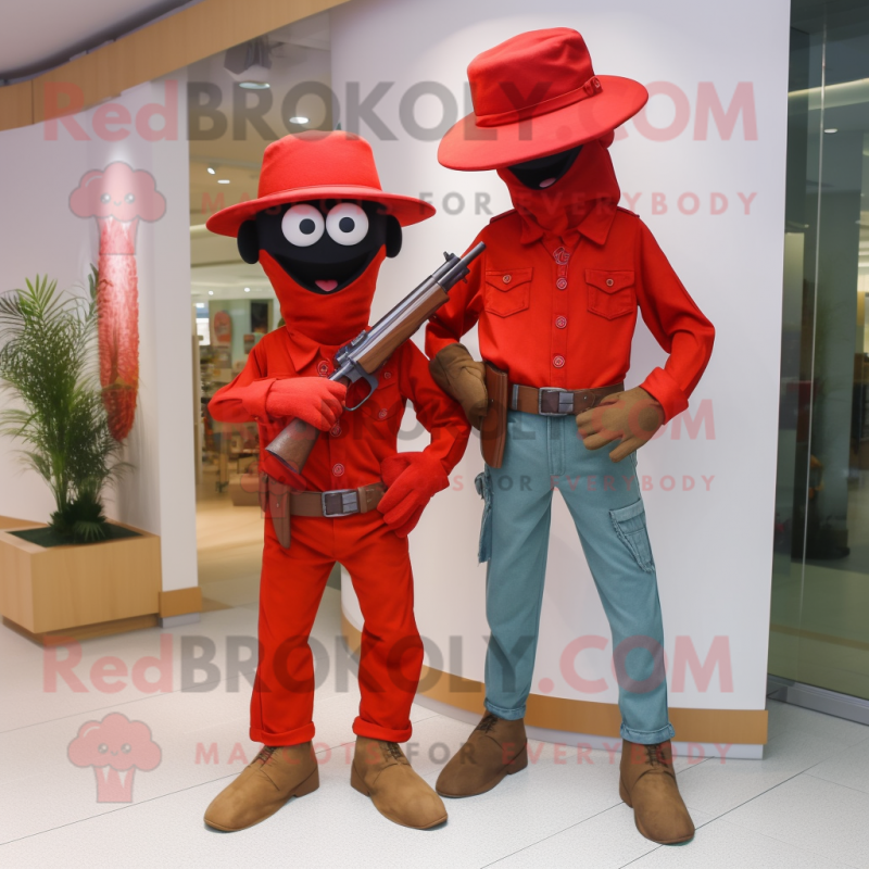 Red Sniper mascot costume character dressed with a Boyfriend Jeans and Cufflinks