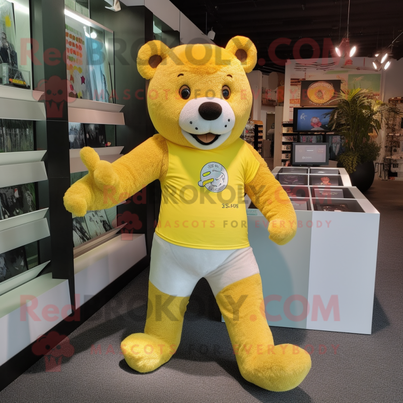 Yellow Bear mascot costume character dressed with a Running Shorts and Coin purses