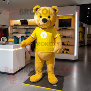 Yellow Bear mascot costume character dressed with a Running Shorts and Coin purses