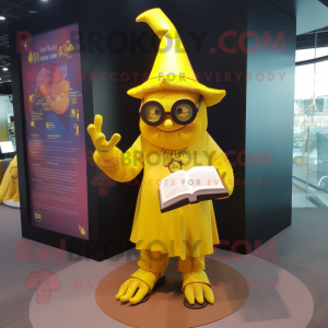 Yellow Witch mascot costume character dressed with a Playsuit and Reading glasses