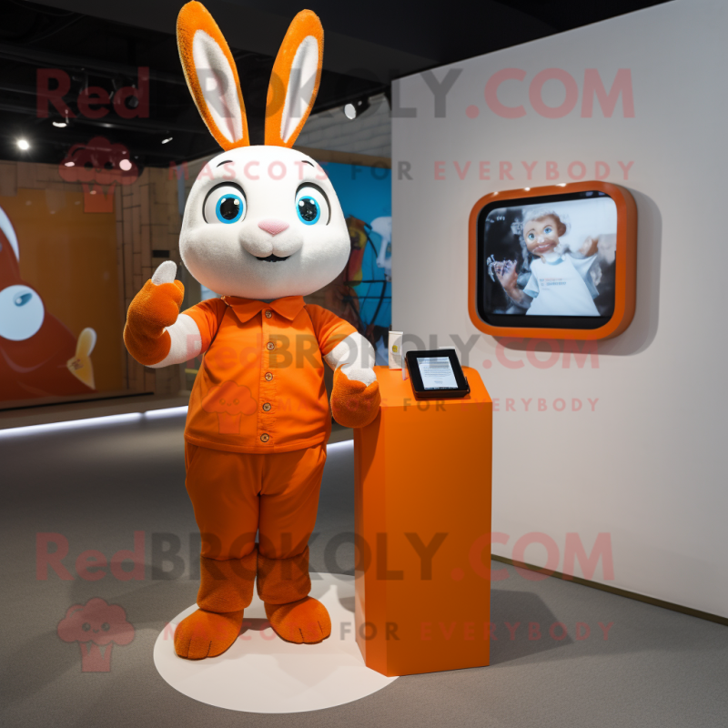 Orange Rabbit mascot costume character dressed with a Sheath Dress and Smartwatches