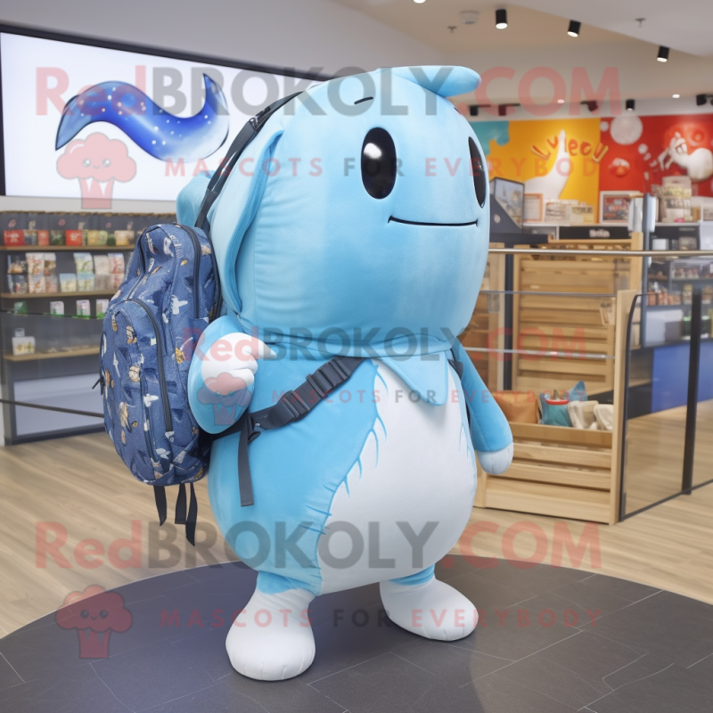 Sky Blue Narwhal mascot costume character dressed with a Graphic Tee and Backpacks Sky Blue Narwhal mascot costume character dressed with a Graphic Tee and Backpacks