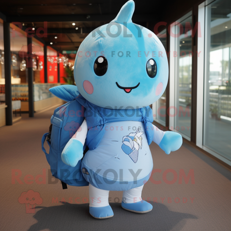 Sky Blue Narwhal mascot costume character dressed with a Graphic Tee and Backpacks