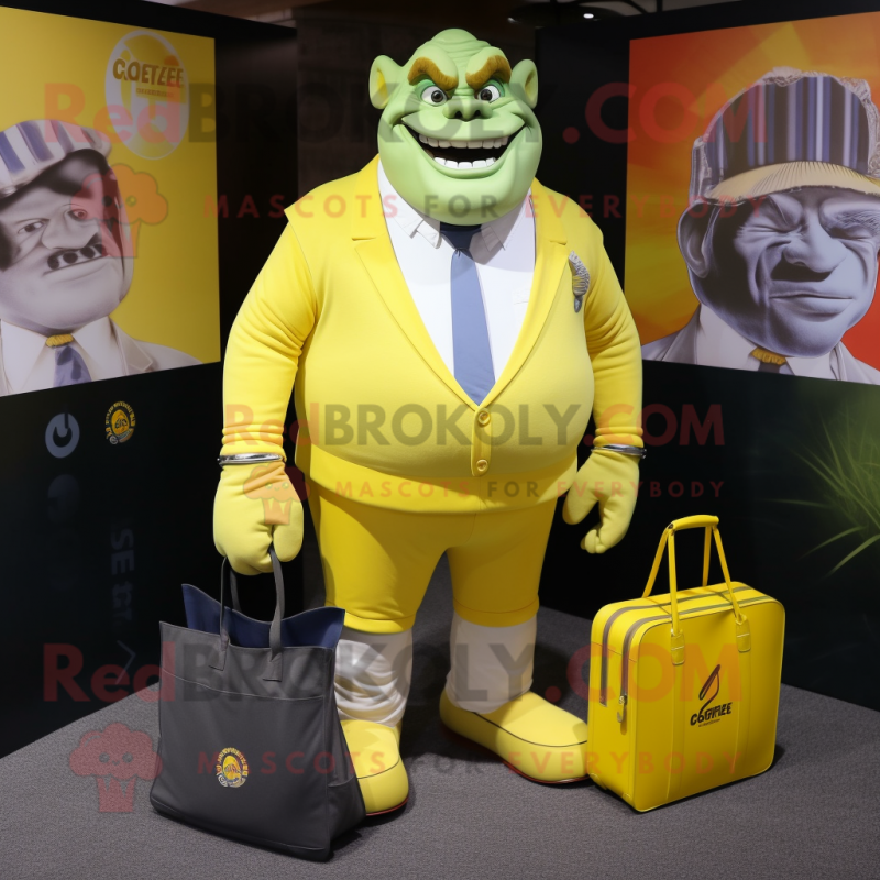 Lemon Yellow Ogre mascot costume character dressed with a Blazer and Tote bags