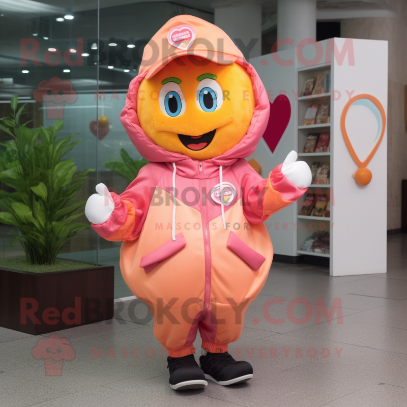 Peach Heart mascot costume character dressed with a Windbreaker and Caps Peach Heart mascot costume character dressed with a Windbreaker and Caps