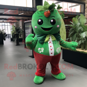 Forest Green Strawberry mascot costume character dressed with a Jumpsuit and Scarves