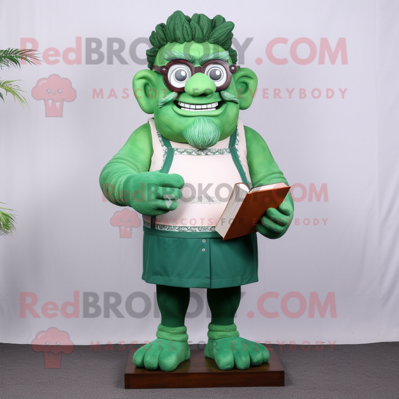 Green Strongman mascot costume character dressed with a Shift Dress and Reading glasses Green Strongman mascot costume character dressed with a Shift Dress and Reading glasses