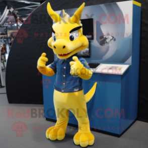 Yellow Dragon mascot costume character dressed with a Denim Shirt and Rings