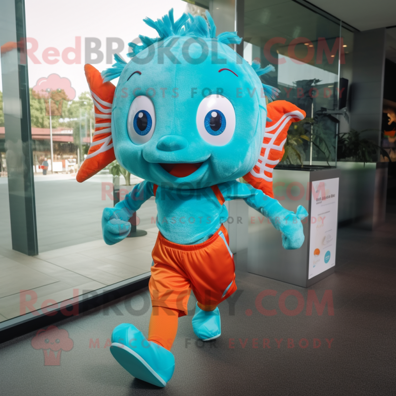 Turquoise Goldfish mascot costume character dressed with a Running Shorts and Hair clips