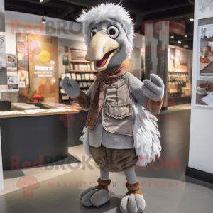 Silver Turkey mascot costume character dressed with a Cardigan and Suspenders