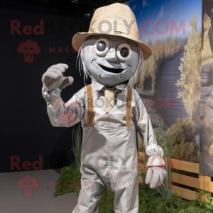 Silver Scarecrow mascot costume character dressed with a Chinos and Headbands