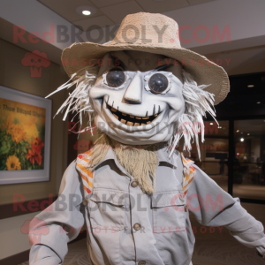 Silver Scarecrow mascot costume character dressed with a Chinos and Headbands