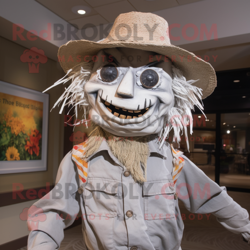 Silver Scarecrow mascot costume character dressed with a Chinos and Headbands Silver Scarecrow mascot costume character dressed with a Chinos and Headbands