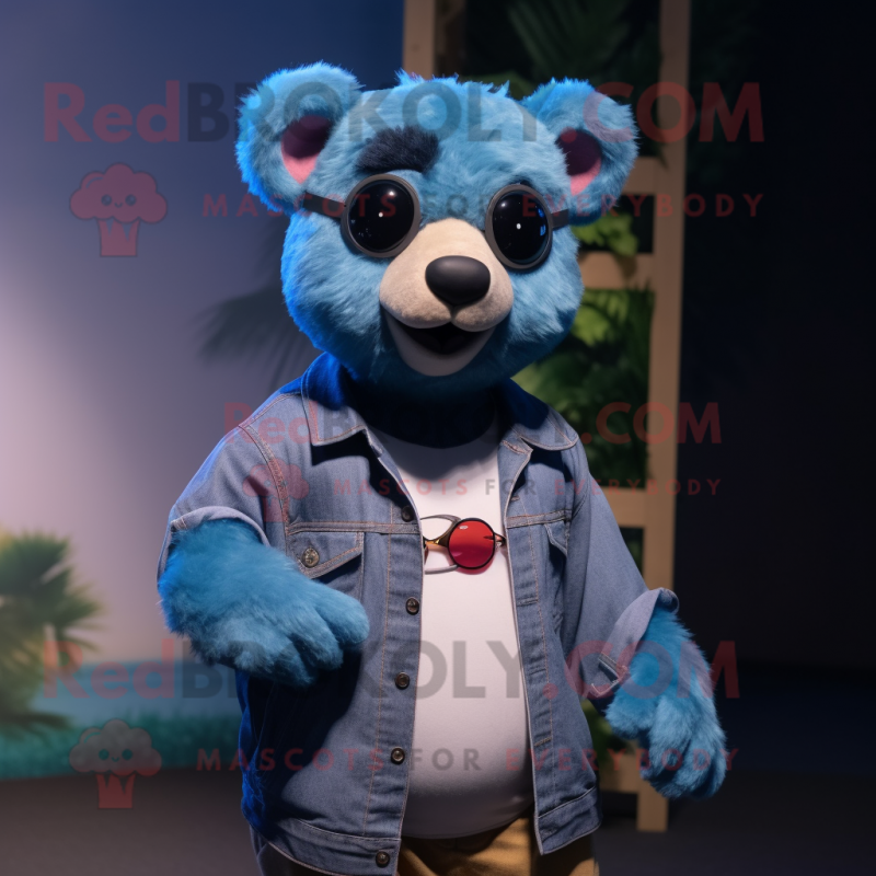 Cyan Spectacled Bear mascot costume character dressed with a Denim Shirt and Digital watches