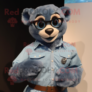 Cyan Spectacled Bear mascot costume character dressed with a Denim Shirt and Digital watches