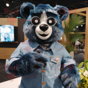 Cyan Spectacled Bear mascot costume character dressed with a Denim Shirt and Digital watches