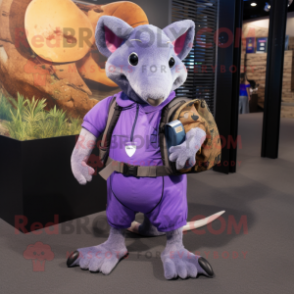 Purple Armadillo mascot costume character dressed with a Dungarees and Messenger bags