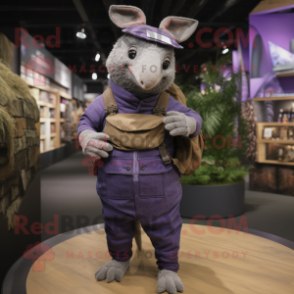 Purple Armadillo mascot costume character dressed with a Dungarees and Messenger bags