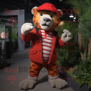 Red Saber-Toothed Tiger mascot costume character dressed with a Cardigan and Berets