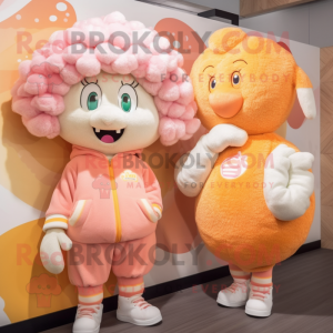 Peach Ram mascot costume character dressed with a Sweatshirt and Hairpins