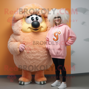 Peach Ram mascot costume character dressed with a Sweatshirt and Hairpins