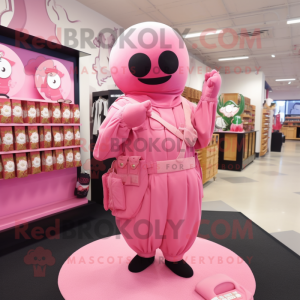 Pink Grenade mascot costume character dressed with a Romper and Shawl pins