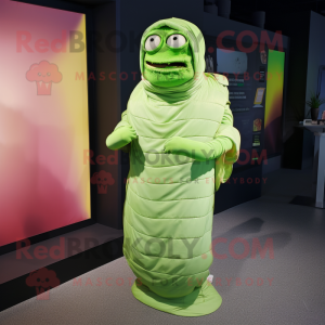 Lime Green Mummy mascot costume character dressed with a Evening Gown and Messenger bags