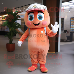 Peach Aglet mascot costume character dressed with a Chinos and Mittens