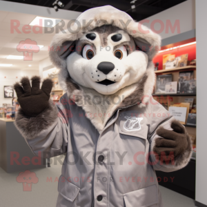 Gray Mountain Lion mascot costume character dressed with a Parka and Gloves