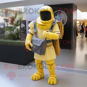 Yellow Spartan Soldier mascot costume character dressed with a Cardigan and Messenger bags
