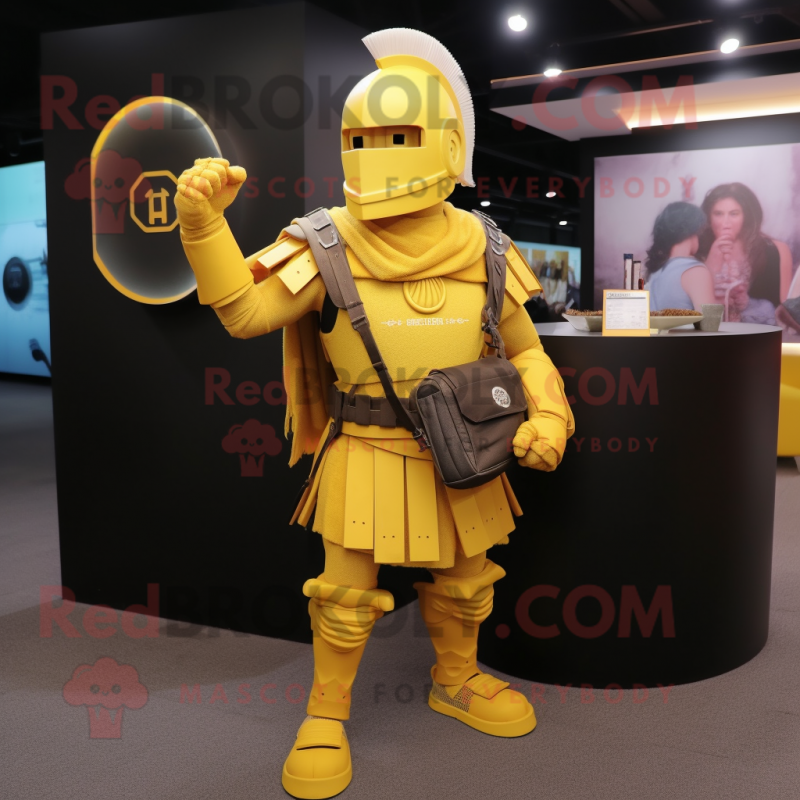 Yellow Spartan Soldier mascot costume character dressed with a Cardigan and Messenger bags