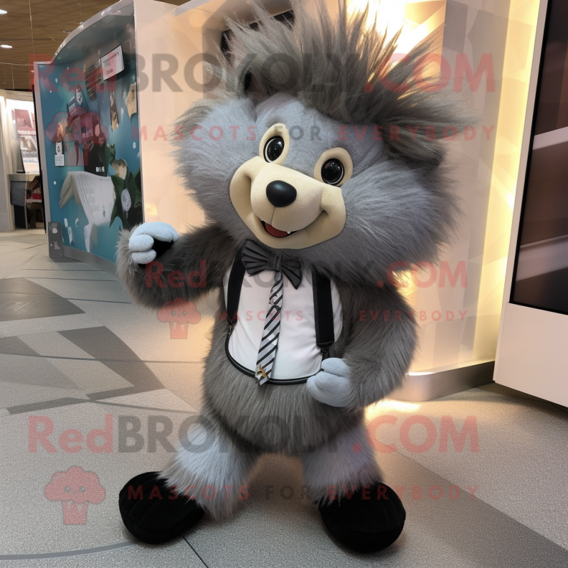 Gray Porcupine mascot costume character dressed with a Jeggings and Bow ties