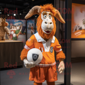 Orange Boer Goat mascot costume character dressed with a Rugby Shirt and Hairpins