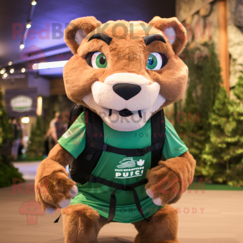Forest Green Mountain Lion mascot costume character dressed with a Shorts and Backpacks