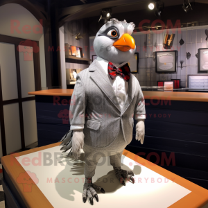 Silver Quail mascot costume character dressed with a Blazer and Bow ties