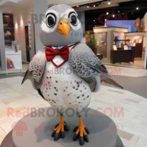 Silver Quail mascot costume character dressed with a Blazer and Bow ties