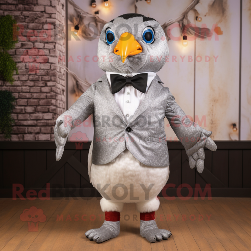 Silver Quail mascot costume character dressed with a Blazer and Bow ties