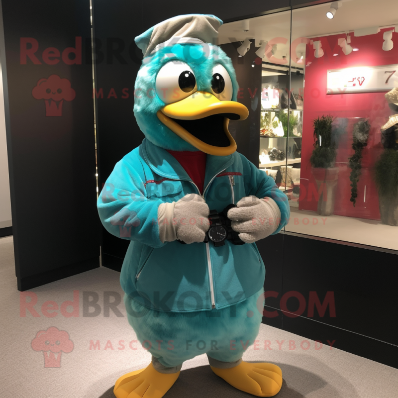 Turquoise Geese mascot costume character dressed with a Corduroy Pants and Bracelet watches