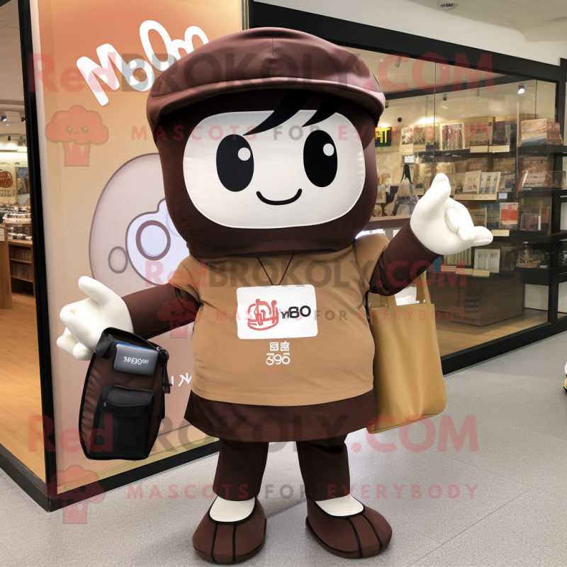 Brown Miso Soup mascot costume character dressed with a Polo Tee and Messenger bags Brown Miso Soup mascot costume character dressed with a Polo Tee and Messenger bags