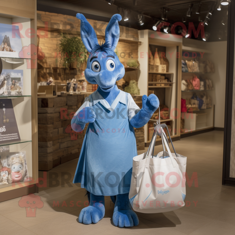 Blue Donkey mascot costume character dressed with a A-Line Dress and Tote bags Blue Donkey mascot costume character dressed with a A-Line Dress and Tote bags