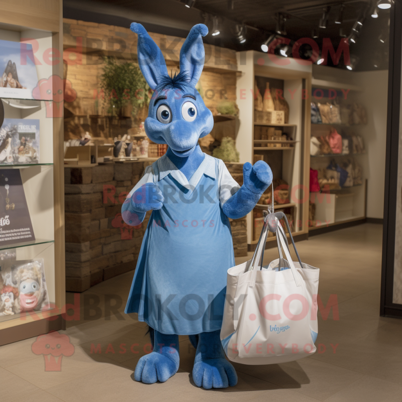 Blue Donkey mascot costume character dressed with a A-Line Dress and Tote bags