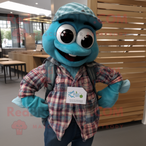 Teal Ceviche mascot costume character dressed with a Flannel Shirt and Shawl pins