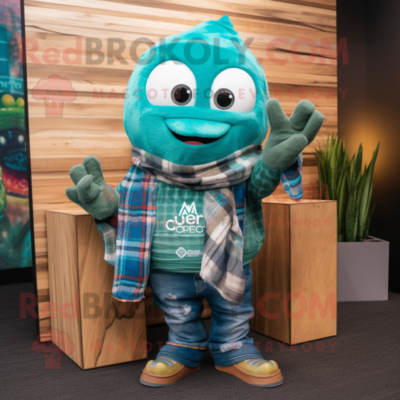Teal Ceviche mascot costume character dressed with a Flannel Shirt and Shawl pins Teal Ceviche mascot costume character dressed with a Flannel Shirt and Shawl pins