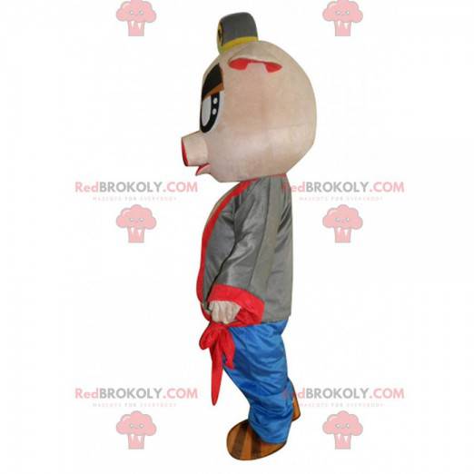 Sehr originelles rosa Schweinemaskottchen mit Rechen -