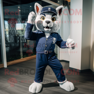 Navy Lynx mascot costume character dressed with a Overalls and Cufflinks