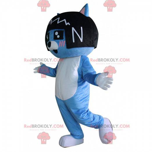 Blaues Katzenmaskottchen mit einer schwarzen Perücke auf seinem