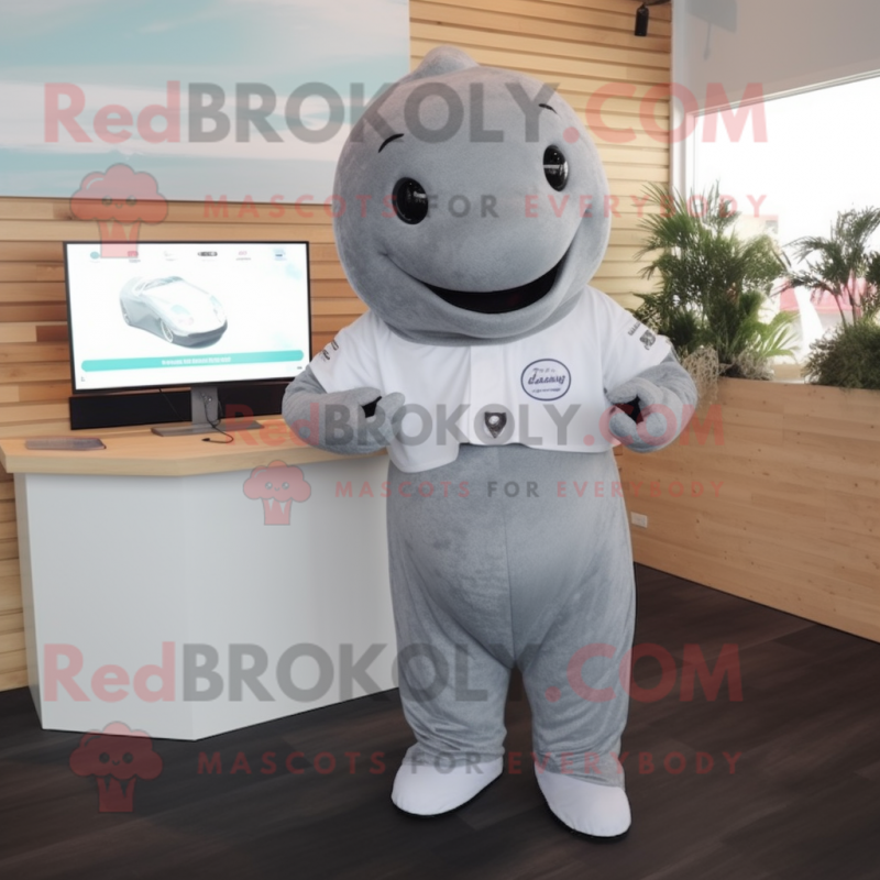 Gray Whale mascot costume character dressed with a V-Neck Tee and Digital watches