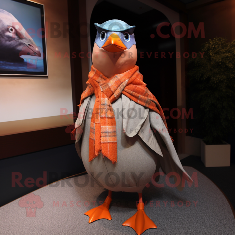 Peach Passenger Pigeon mascot costume character dressed with a Cover-up and Scarves