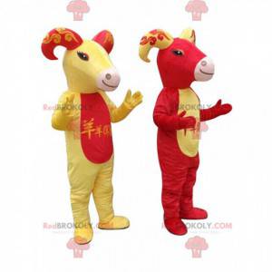 2 maskoter med røde og gule geiter, geitekostymer -